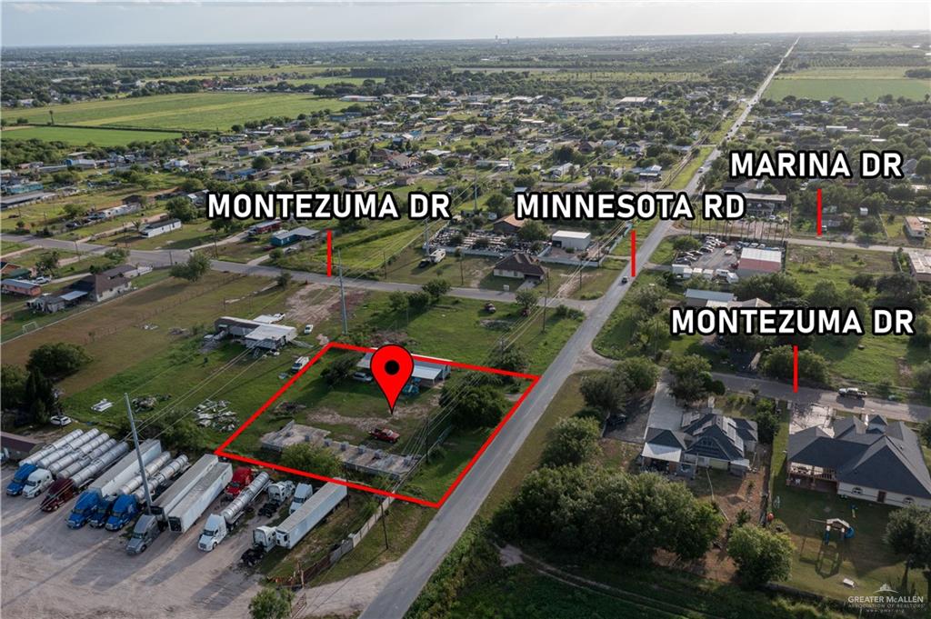 303 Minnesota Road Alamo, TX 78516 - Photo 3 of 4 an outdoor space with seating area and car parked