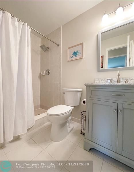 Limetree Condominiums Boynton Beach, FL 33436 - Photo 17 of 45 Separate and spacious, spa-like Guest Bathroom is beautifully remodeled, immaculately clean and features a large step-in shower in neutral finishes.