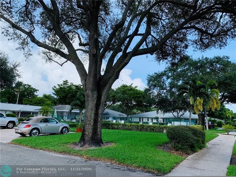 Limetree Condominiums Boynton Beach, FL 33436 - Photo 28 of 45 Another photo of Limetree's East Pool with Guest Parking is accessed easily and conveniently, just a few steps away and directly across the street from Villa 252.