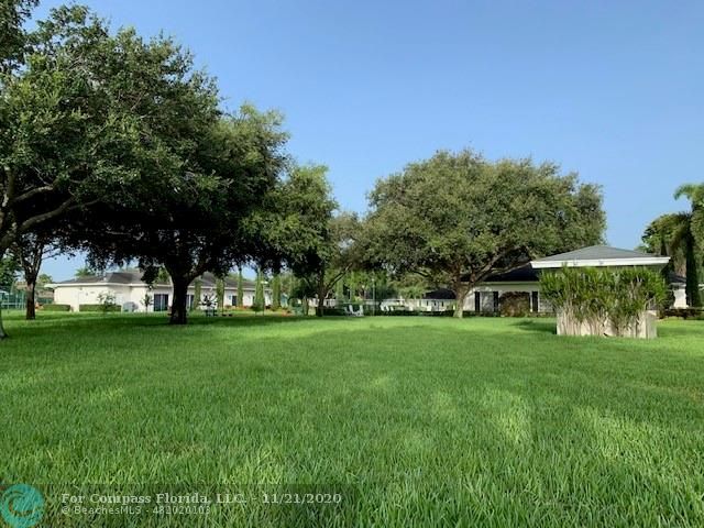 Limetree Condominiums Boynton Beach, FL 33436 - Photo 39 of 45 Limetree's expansive outdoor multi-acre recreation green-space. Clubhouse on right, Activity Building on left, Center Pool, Bocce Ball plus Shuffle Board are centered between the buildings. All conveniently located, a short walk from Villa 252.