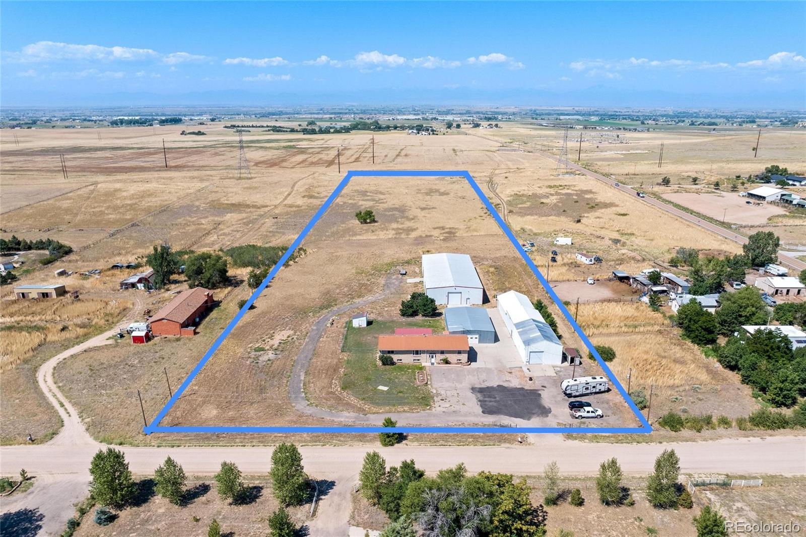 2869 Mathews Avenue Fort Lupton, CO 80621 - Photo 2 of 49 a view of an ocean with beach