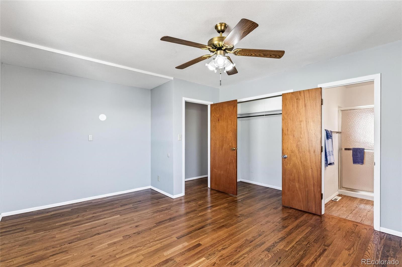 2869 Mathews Avenue Fort Lupton, CO 80621 - Photo 22 of 49 a view of an empty room with wooden floor