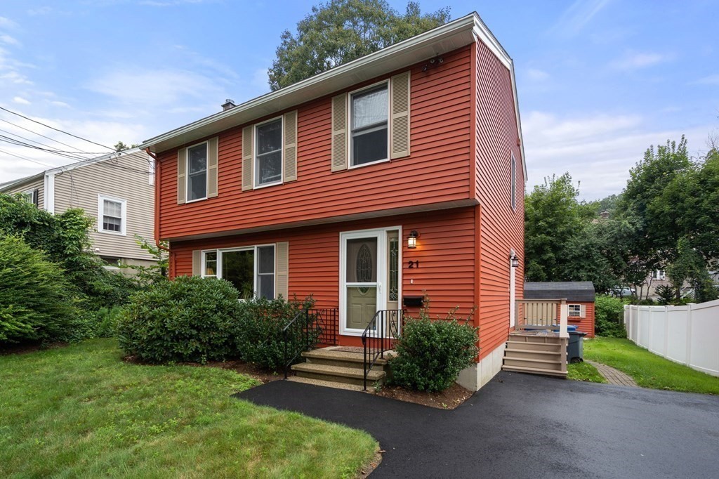 21 Summit Avenue Waltham, MA 02453 - Photo 19 of 19 a front view of a house with a yard