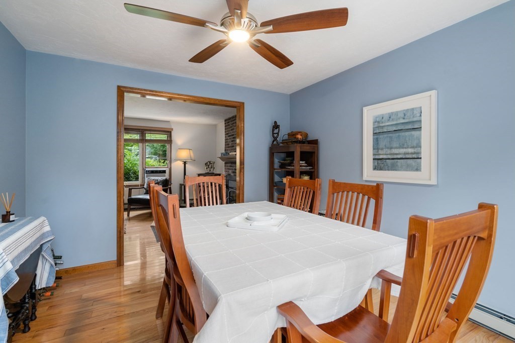 21 Summit Avenue Waltham, MA 02453 - Photo 5 of 19 a view of a dining room with furniture and a chandelier