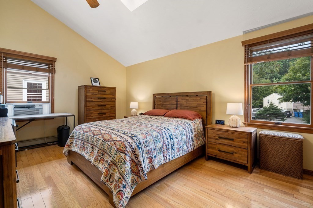 21 Summit Avenue Waltham, MA 02453 - Photo 8 of 19 a bedroom with a bed and a window