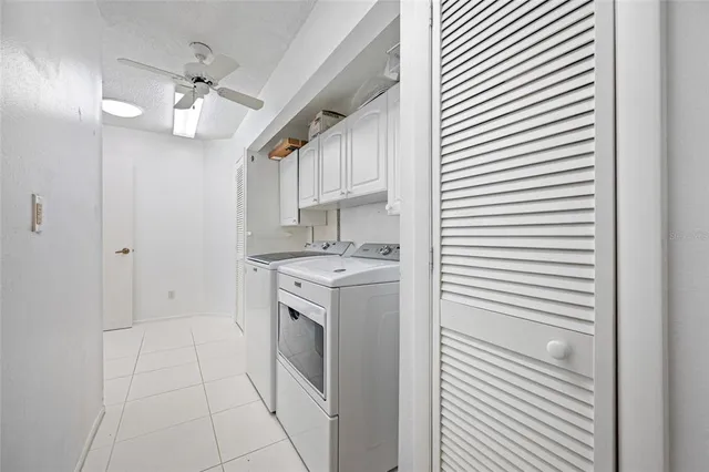 a spacious bathroom with a granite countertop sink a toilet and shower