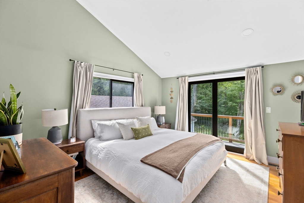 47 Pennfield Road Scituate, MA 02066 - Photo 13 of 27 a bedroom with a large bed and a window