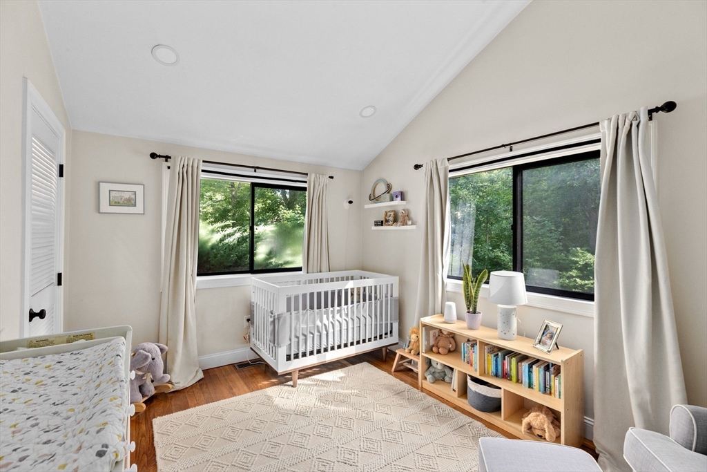 47 Pennfield Road Scituate, MA 02066 - Photo 15 of 27 a bedroom with furniture and a large window