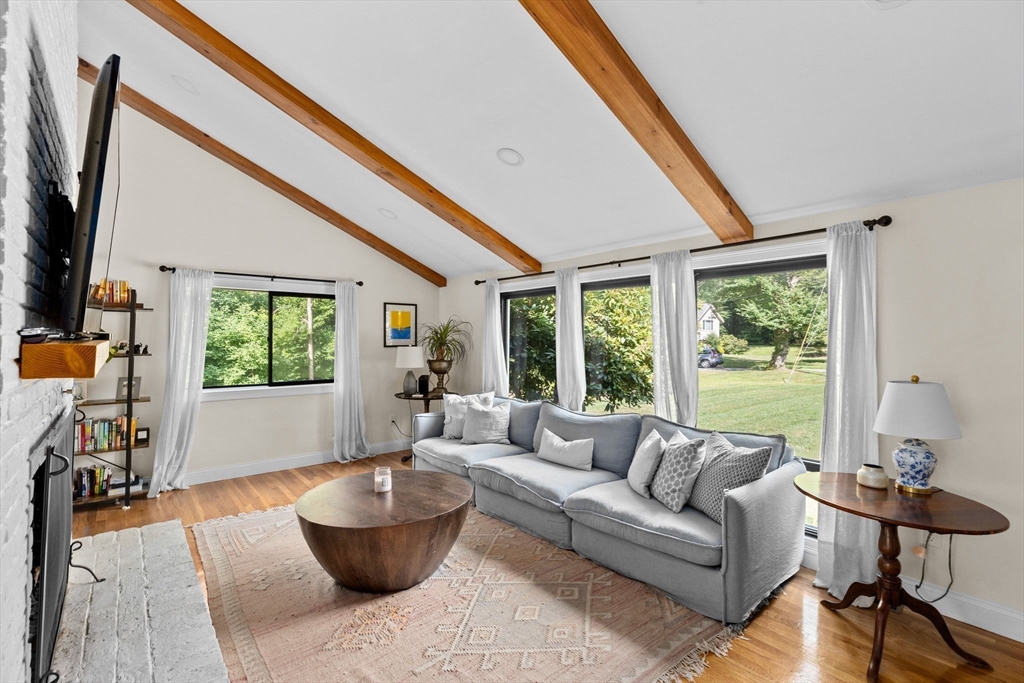 47 Pennfield Road Scituate, MA 02066 - Photo 4 of 27 a living room with furniture and a large window