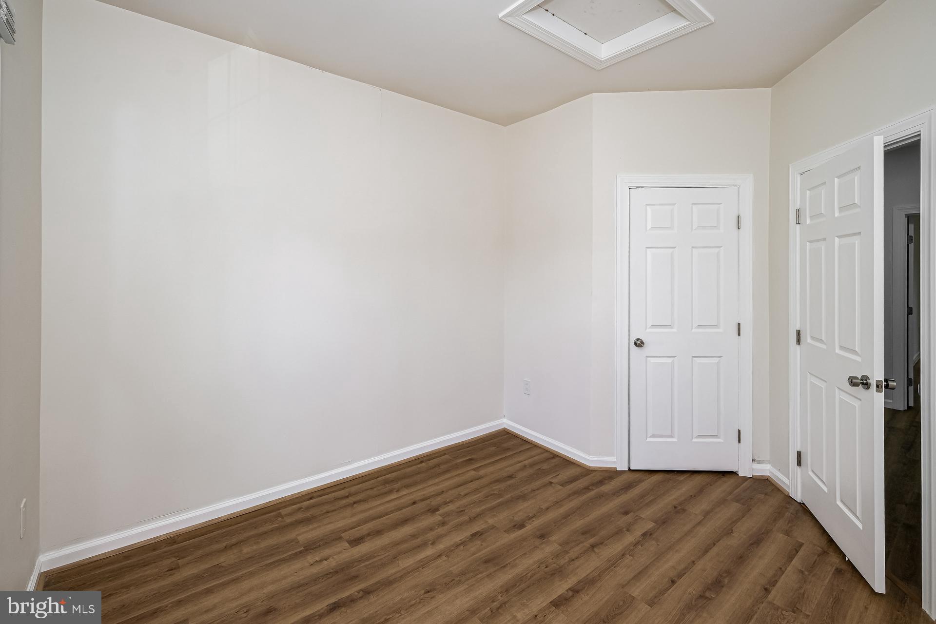 6270 Levi Court Springfield, VA 22150 - Photo 17 of 22 a view of empty room with wooden floor