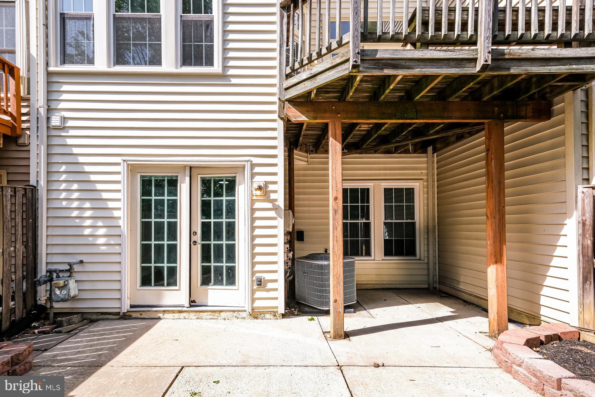 6270 Levi Court Springfield, VA 22150 - Photo 5 of 22 a front view of a house with a garage