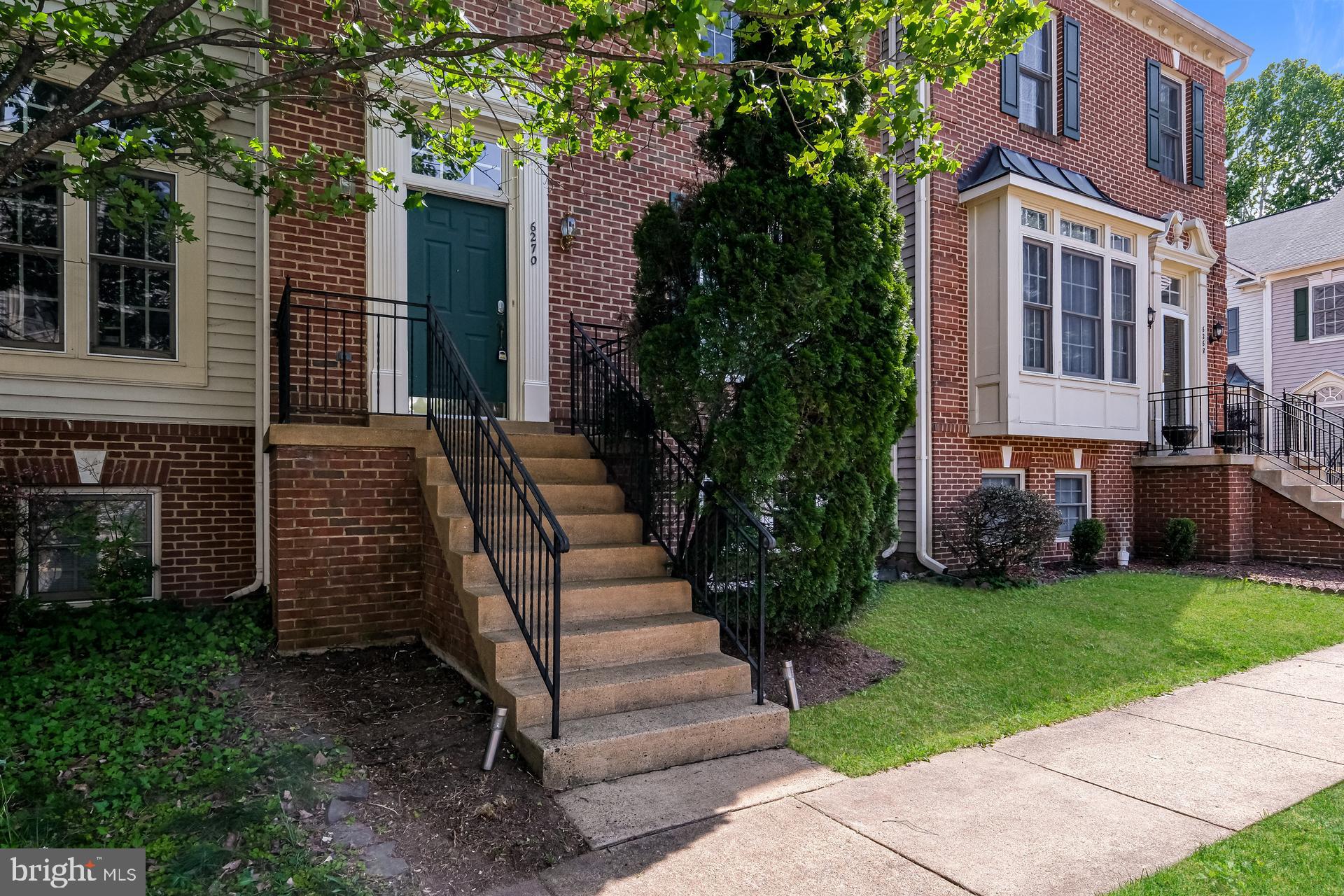 6270 Levi Court Springfield, VA 22150 - Photo 10 of 22 a view of a house with a yard