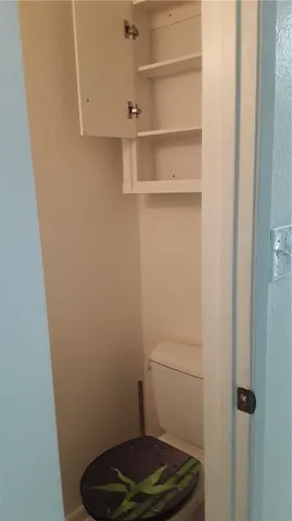 a view of wooden floor and windows in an empty room