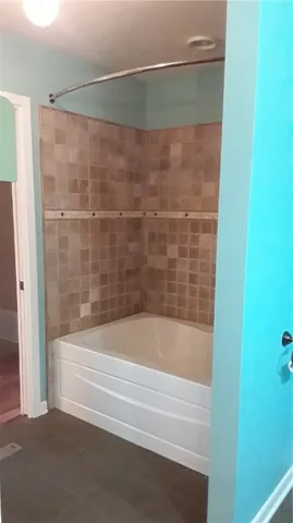 a bathroom with a bathtub