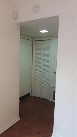 a view of a small space with a fan