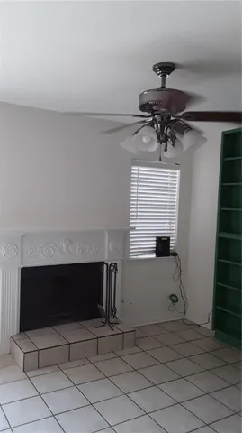 a stove top oven sitting inside of a kitchen