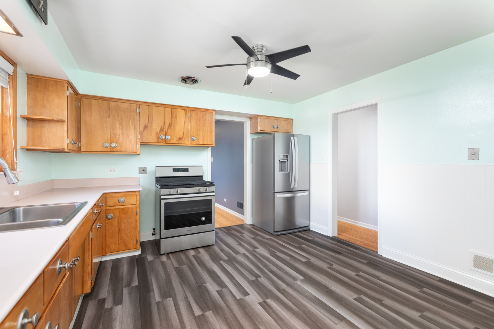 536 Prairie Avenue Downers Grove, IL 60515 - Photo 13 of 33 a kitchen with a refrigerator and a stove top oven