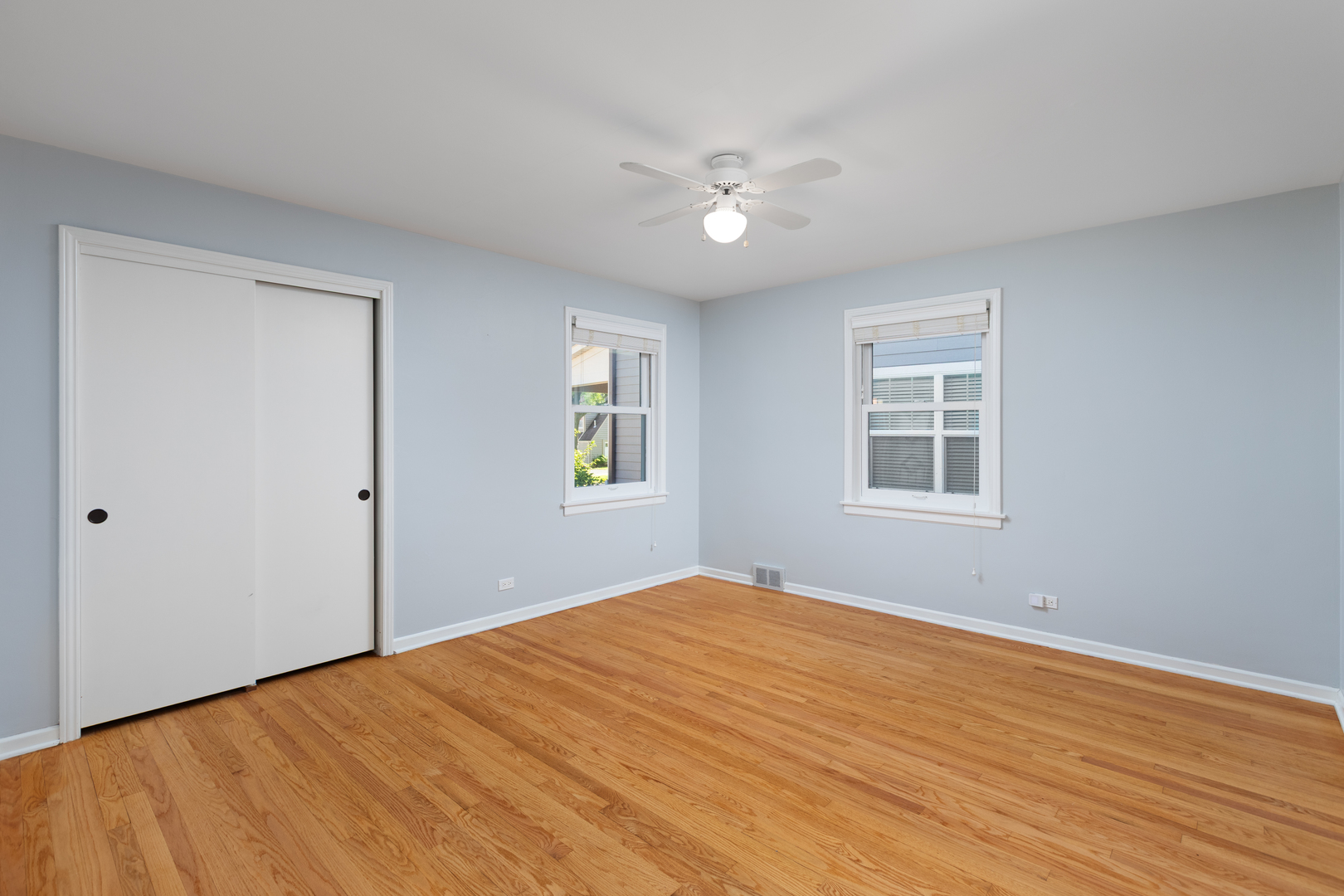 536 Prairie Avenue Downers Grove, IL 60515 - Photo 15 of 33 a view of empty room with wooden floor and fan
