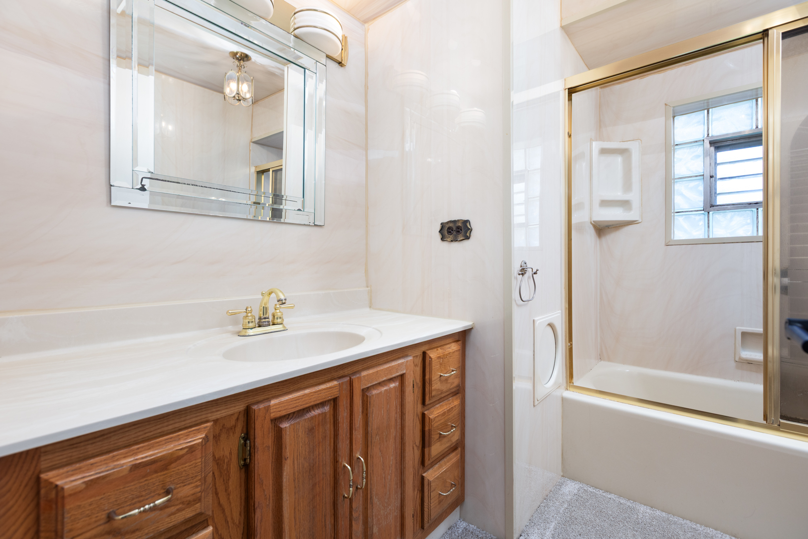 536 Prairie Avenue Downers Grove, IL 60515 - Photo 19 of 33 a bathroom with a sink and a mirror