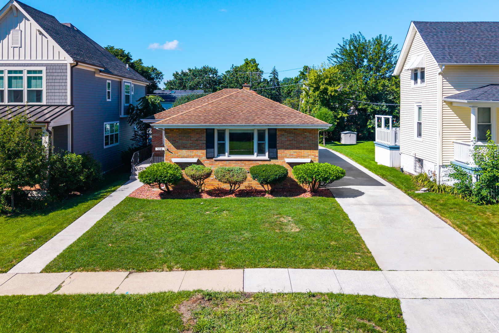 536 Prairie Avenue Downers Grove, IL 60515 - Photo 32 of 33 a front view of a house with a yard