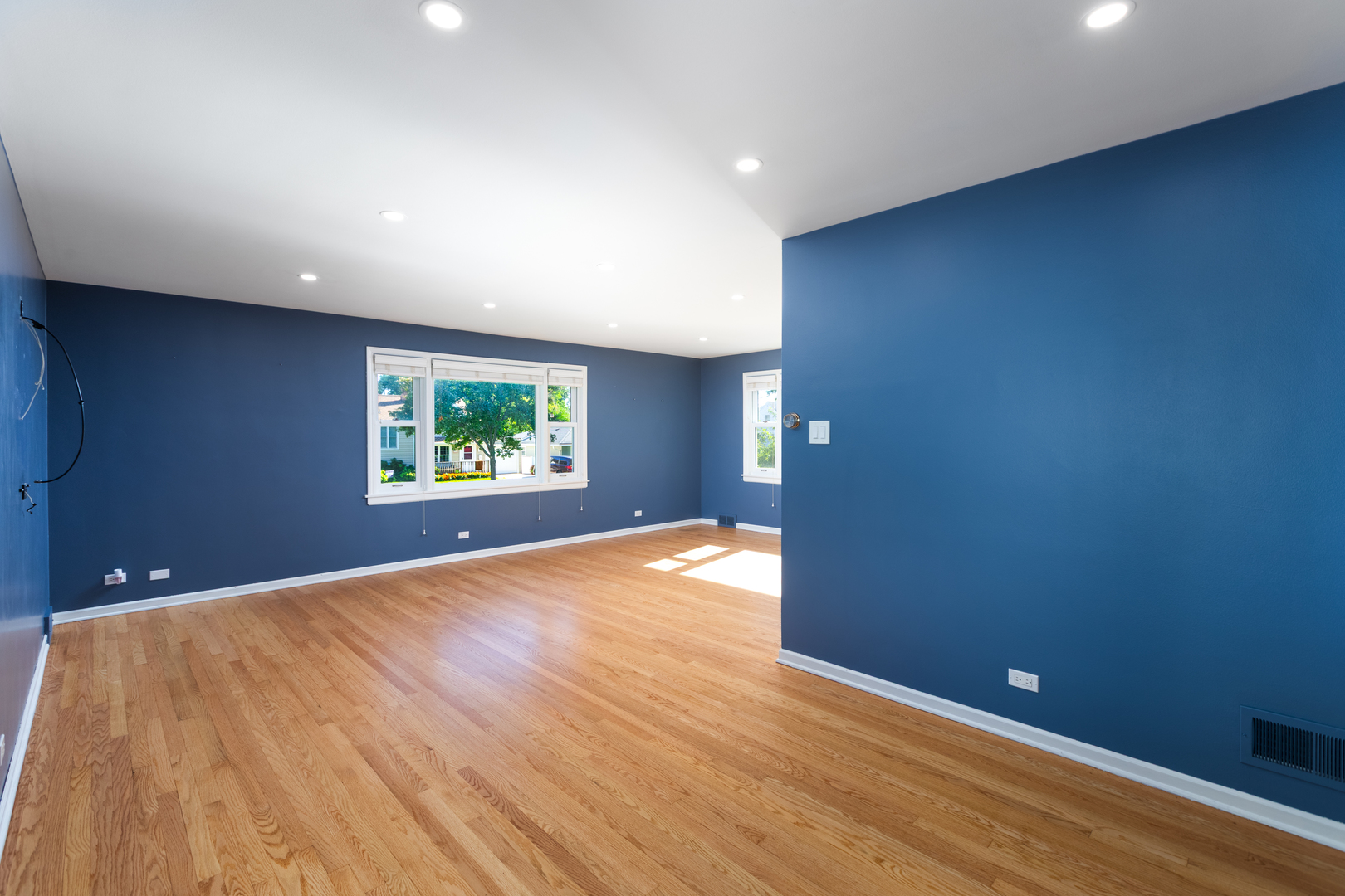 536 Prairie Avenue Downers Grove, IL 60515 - Photo 9 of 33 wooden floor in an empty room with a window
