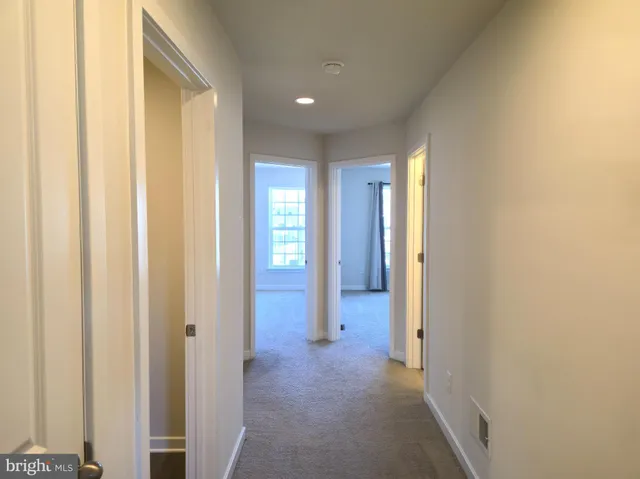 a view of entryway with livingroom