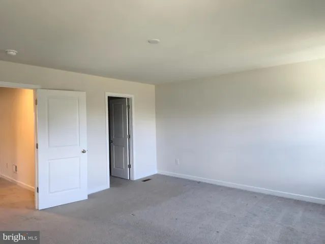 an empty room with closet