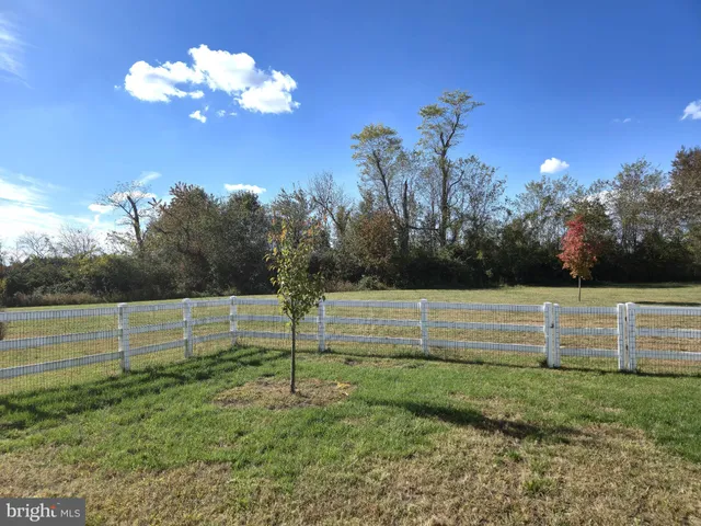 a view of a house with a street