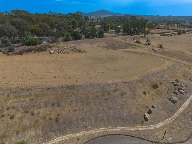 an aerial view of residential house with outdoor space