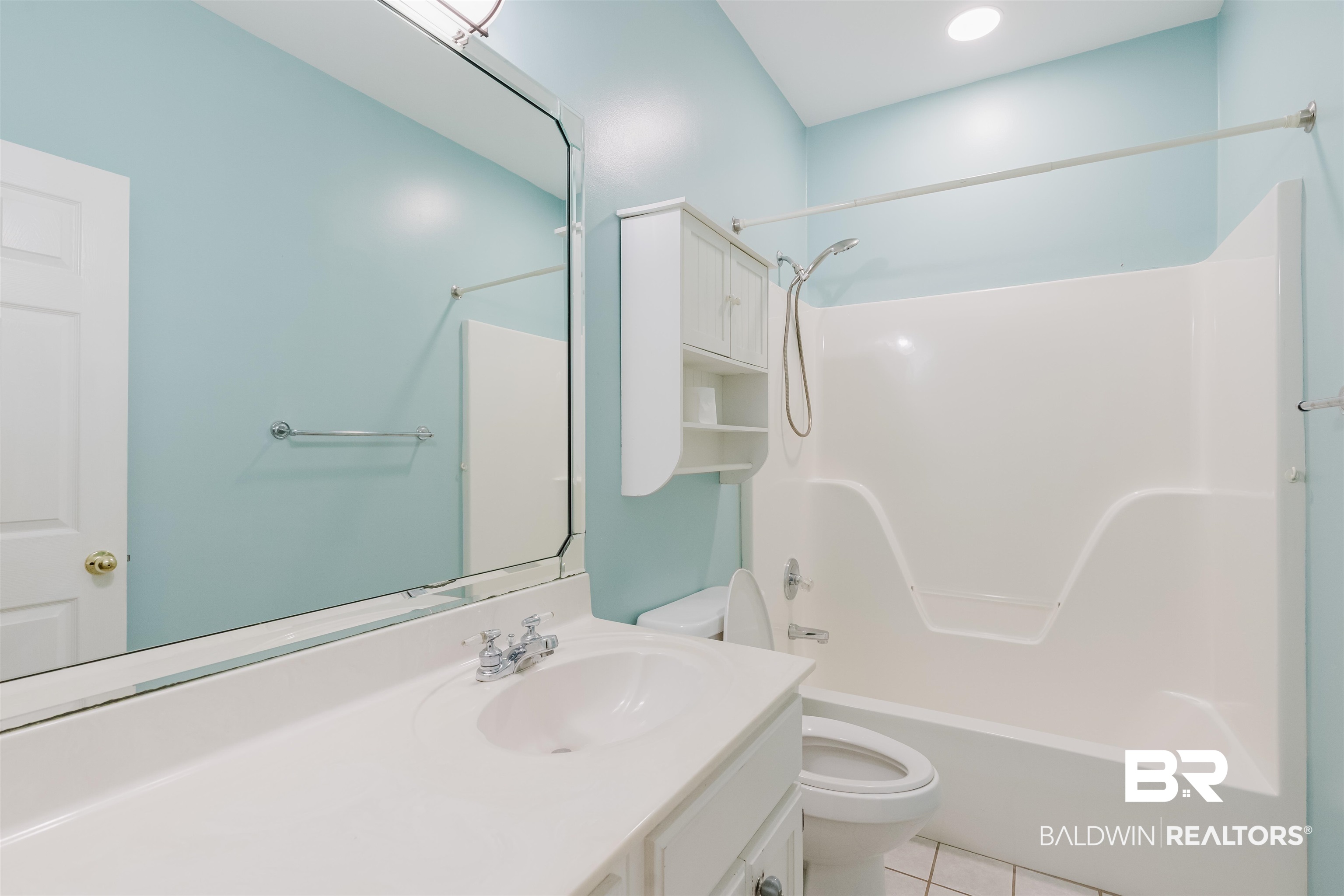 19711 Hunters Loop Fairhope, AL 36532 - Photo 29 of 49 Bathroom featuring toilet, vanity, tub / shower combination, and tile patterned flooring