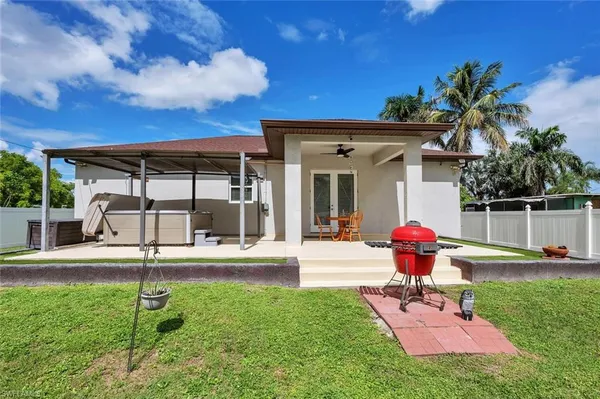 a front view of a house with a yard and porch