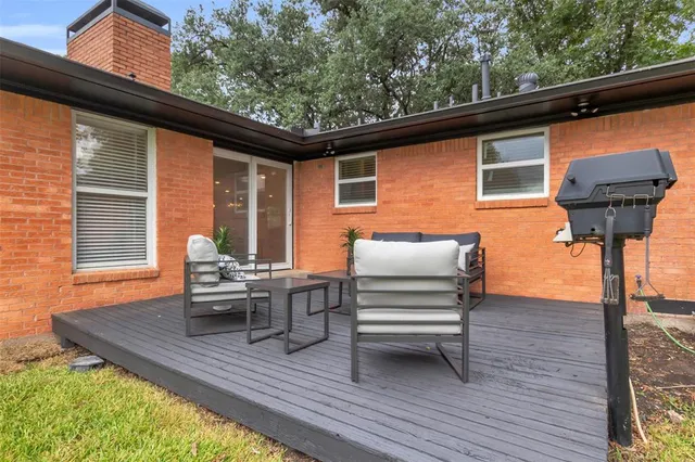 a backyard of a house with seating space