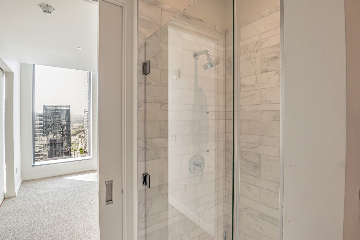 210 Lavaca Street, Unit 2903 Austin, TX 78701 - Photo 21 of 39 a bathroom with a shower