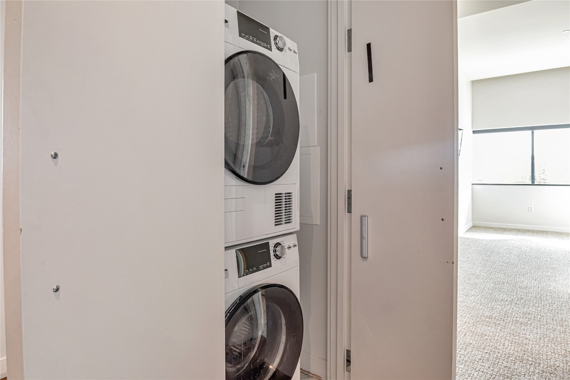 210 Lavaca Street, Unit 2903 Austin, TX 78701 - Photo 22 of 39 a utility room with dryer and washer