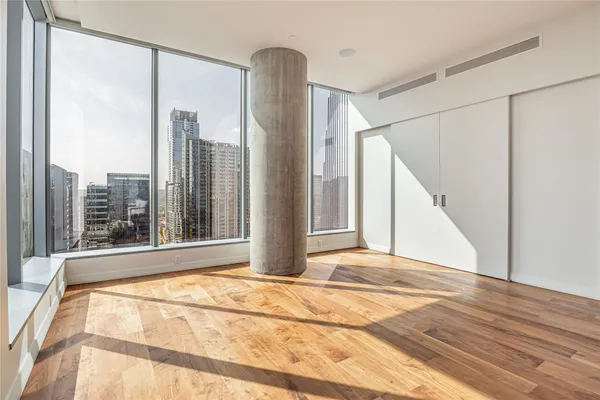 a view of a room with a large window