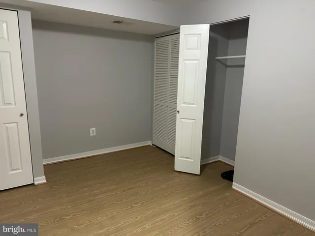 an empty room with closet