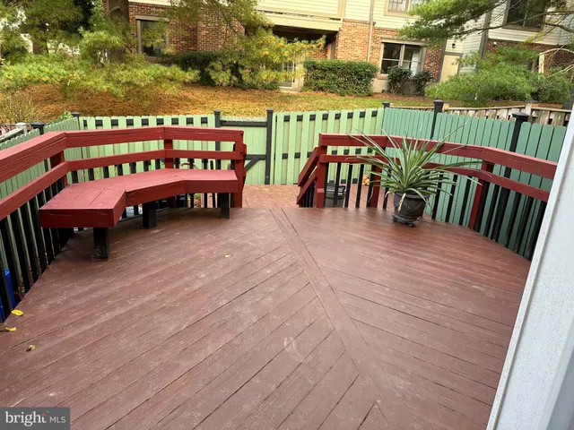 a view of a chairs and table on the deck