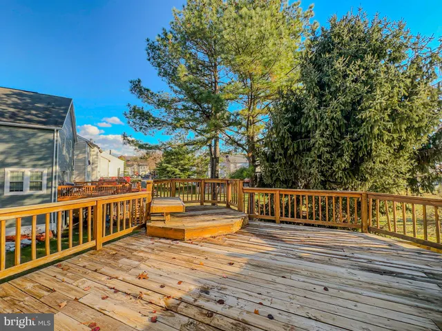 a view of a balcony with chairs