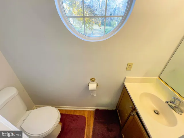 a bathroom with a toilet and a sink