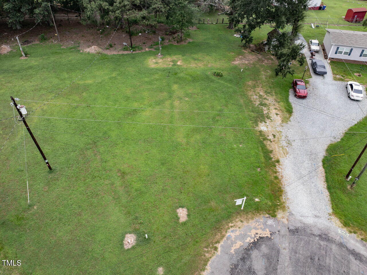 224 Holiday Park Road Hillsborough, NC 27278 - Photo 4 of 11 a backyard of a house with lots of green space