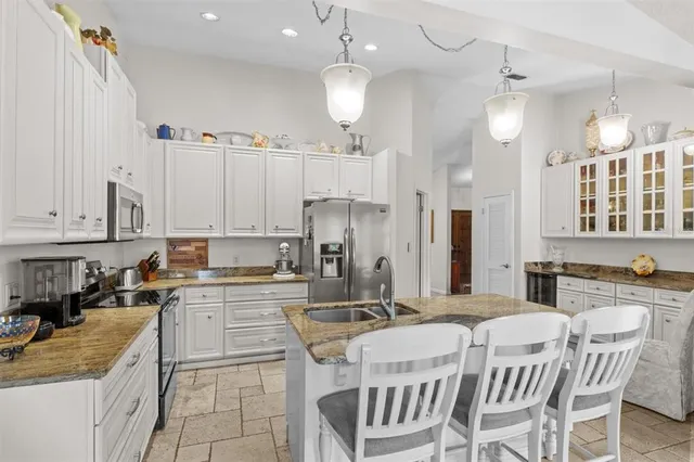 a view of a livingroom with furniture window and wooden floor