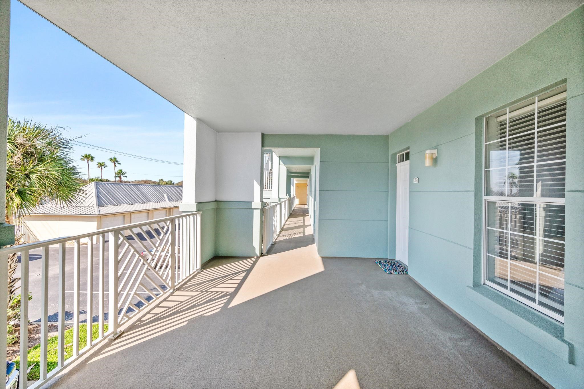 285 Atlantis Circle, Unit 203 St. Augustine, FL 32080 - Photo 3 of 66 a view of a porch and wooden floor