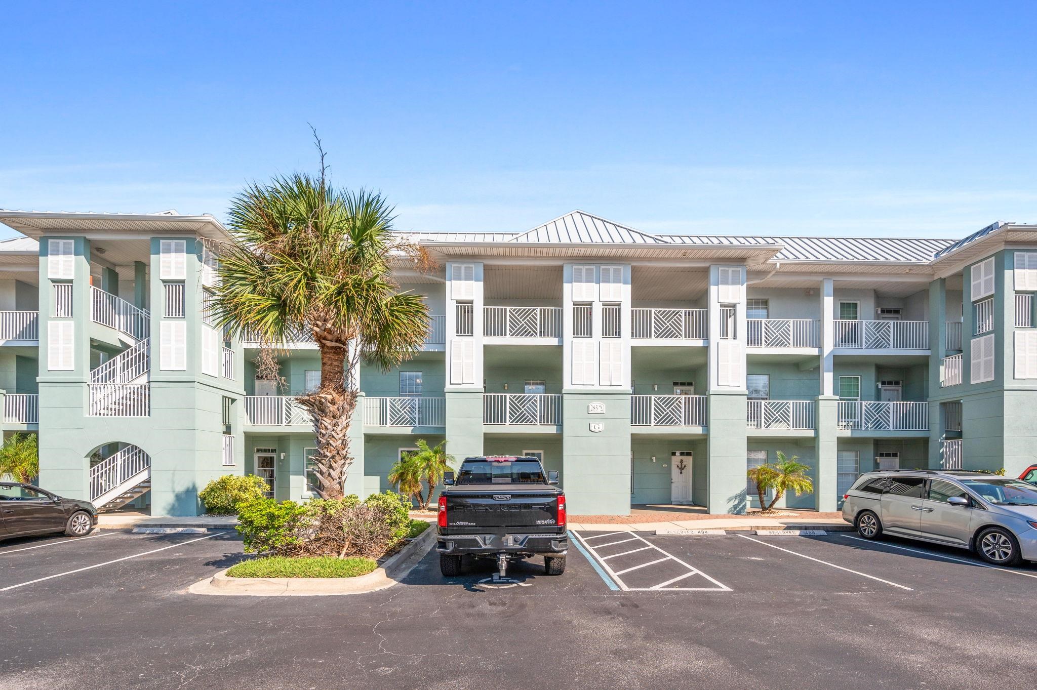 285 Atlantis Circle, Unit 203 St. Augustine, FL 32080 - Photo 44 of 66 a car parked in front of a building