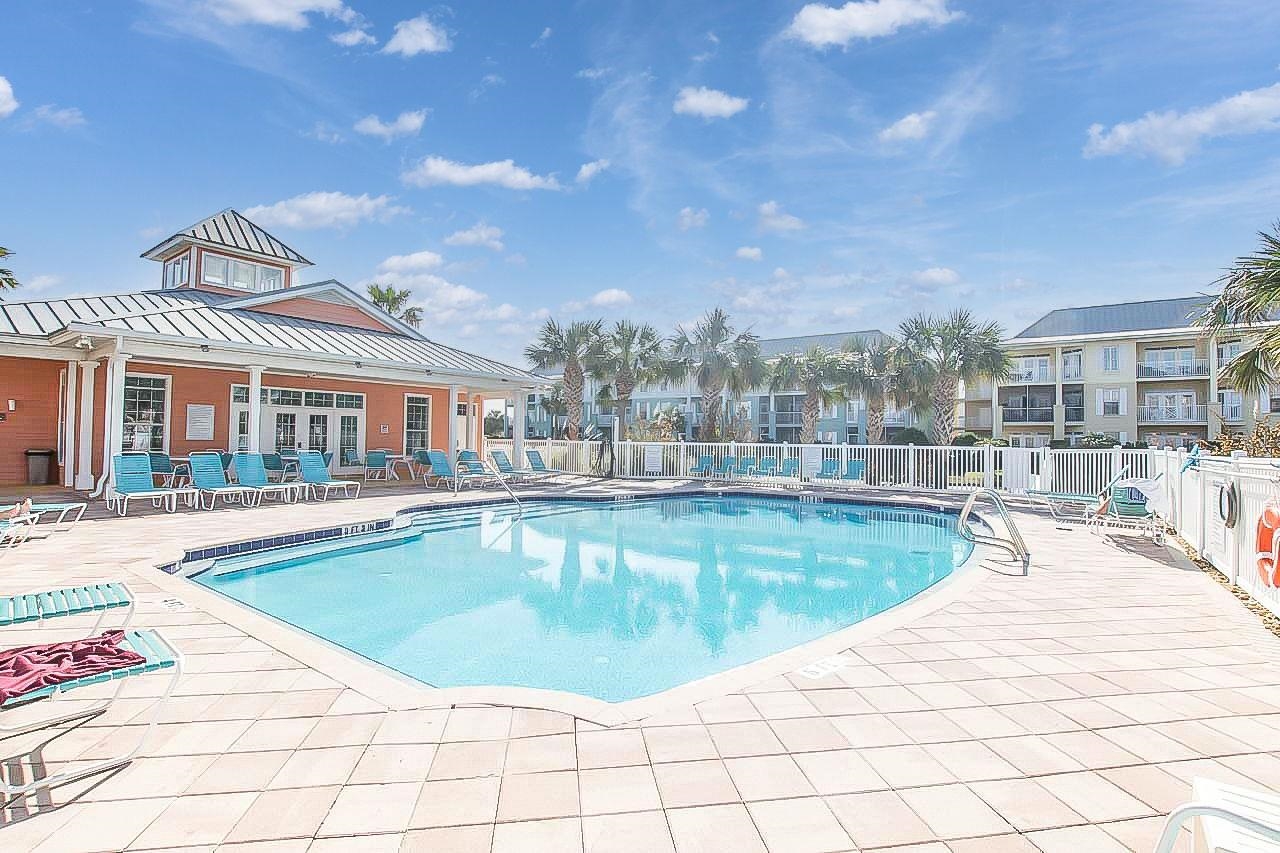 285 Atlantis Circle, Unit 203 St. Augustine, FL 32080 - Photo 50 of 66 a view of a swimming pool and a outdoor space