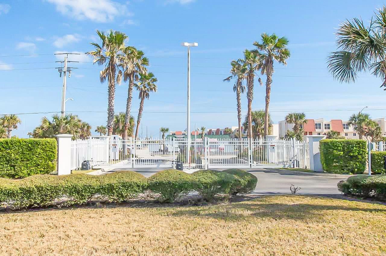 285 Atlantis Circle, Unit 203 St. Augustine, FL 32080 - Photo 54 of 66 a view of a yard with palm trees