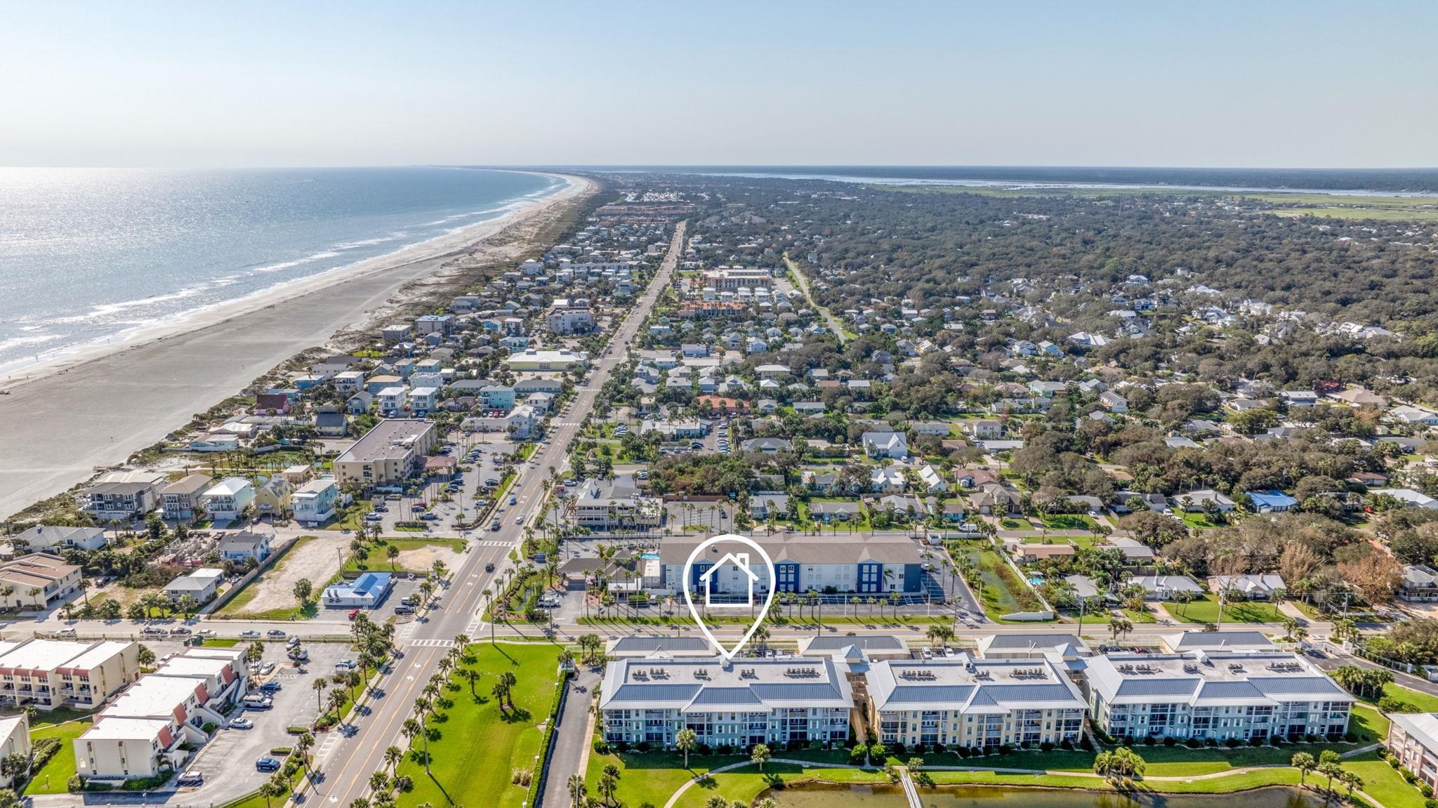 285 Atlantis Circle, Unit 203 St. Augustine, FL 32080 - Photo 59 of 66 an aerial view of a building with floor to ceiling windows