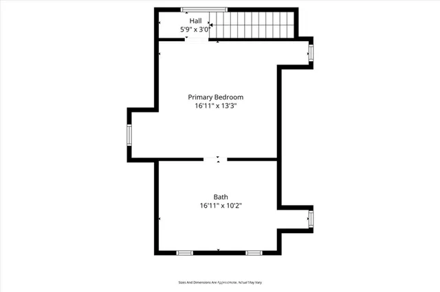 a picture of floor with a white wall and a painting