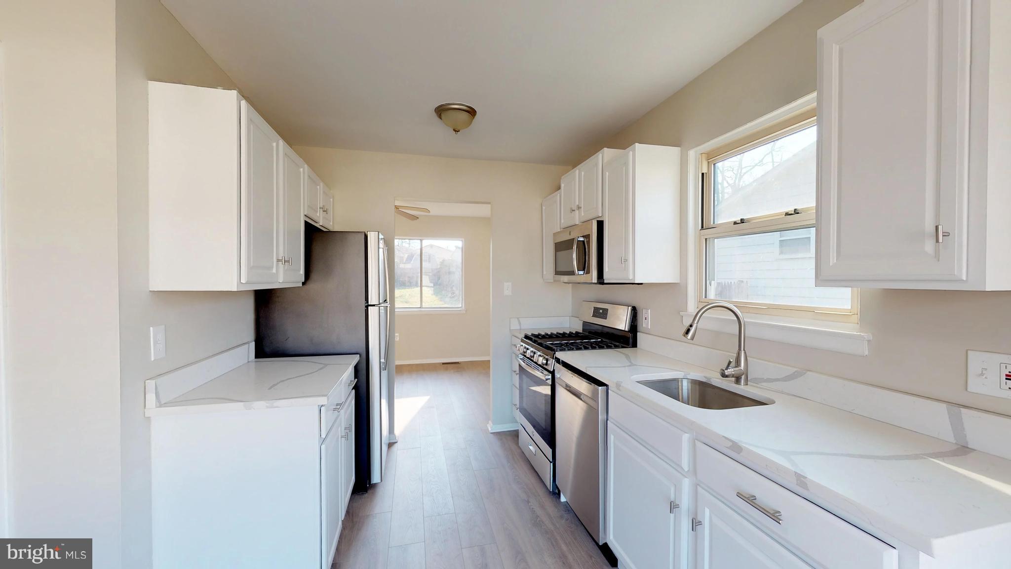 8807 Crandall Road Lanham, MD 20706 - Photo 3 of 13 Renovated Kitchen with New Appliances