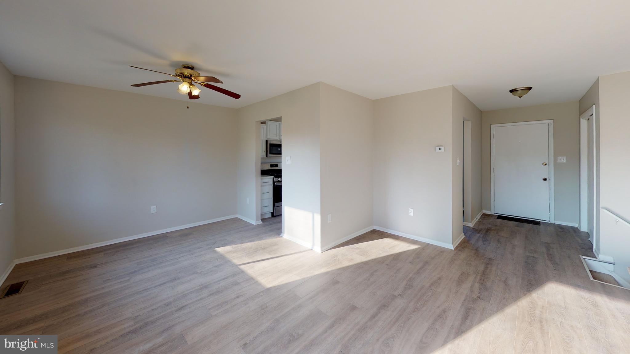 8807 Crandall Road Lanham, MD 20706 - Photo 5 of 13 Living Room & Dining Room View