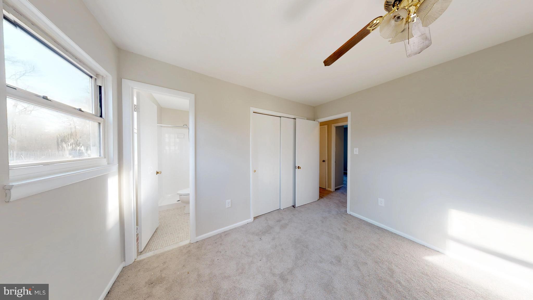 8807 Crandall Road Lanham, MD 20706 - Photo 10 of 13 Master Bedroom with ensuite bath